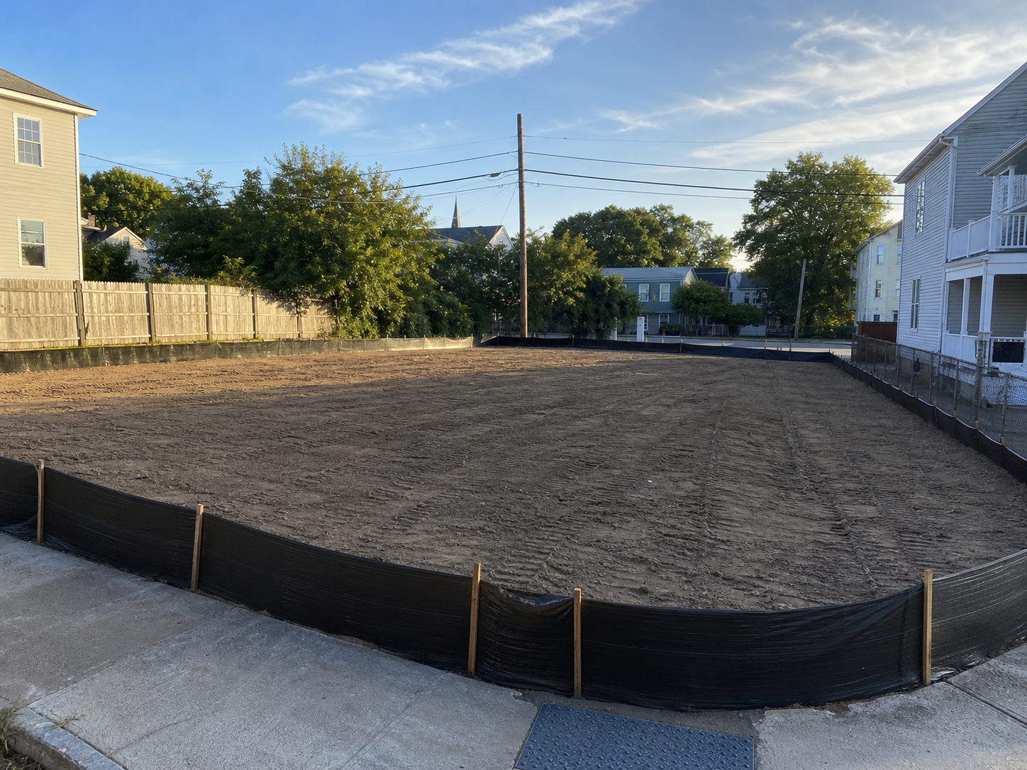 Cleared and graded site after completed demolition